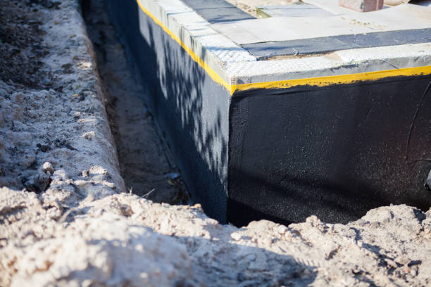 Professional Exterior Waterproofing technician working in Guilford, IN